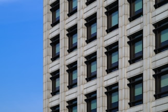 A tall building with a clock on the side of it