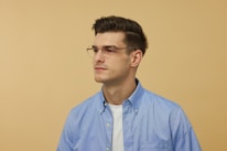 A man in a blue shirt and tie