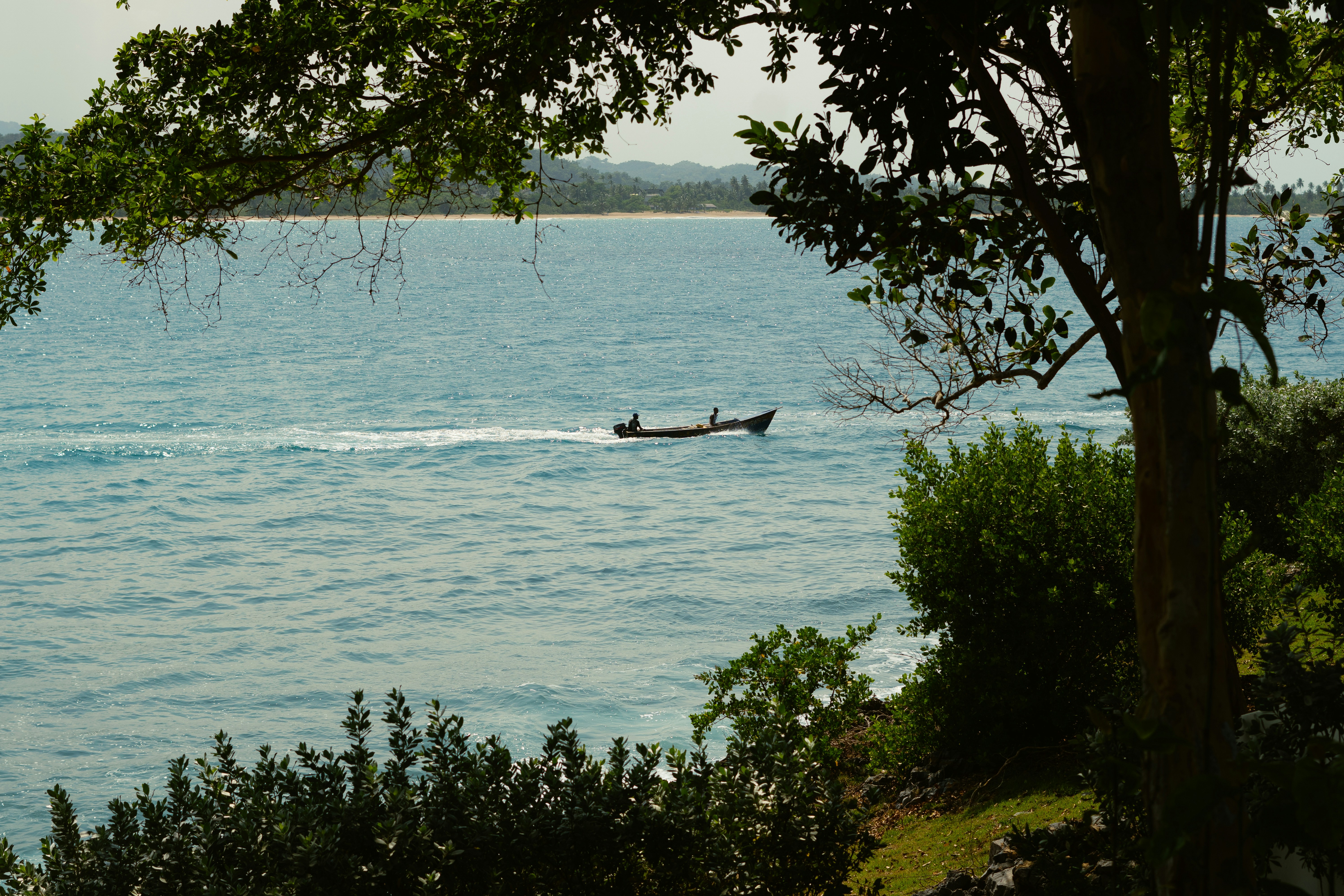 A person in a boat in the water