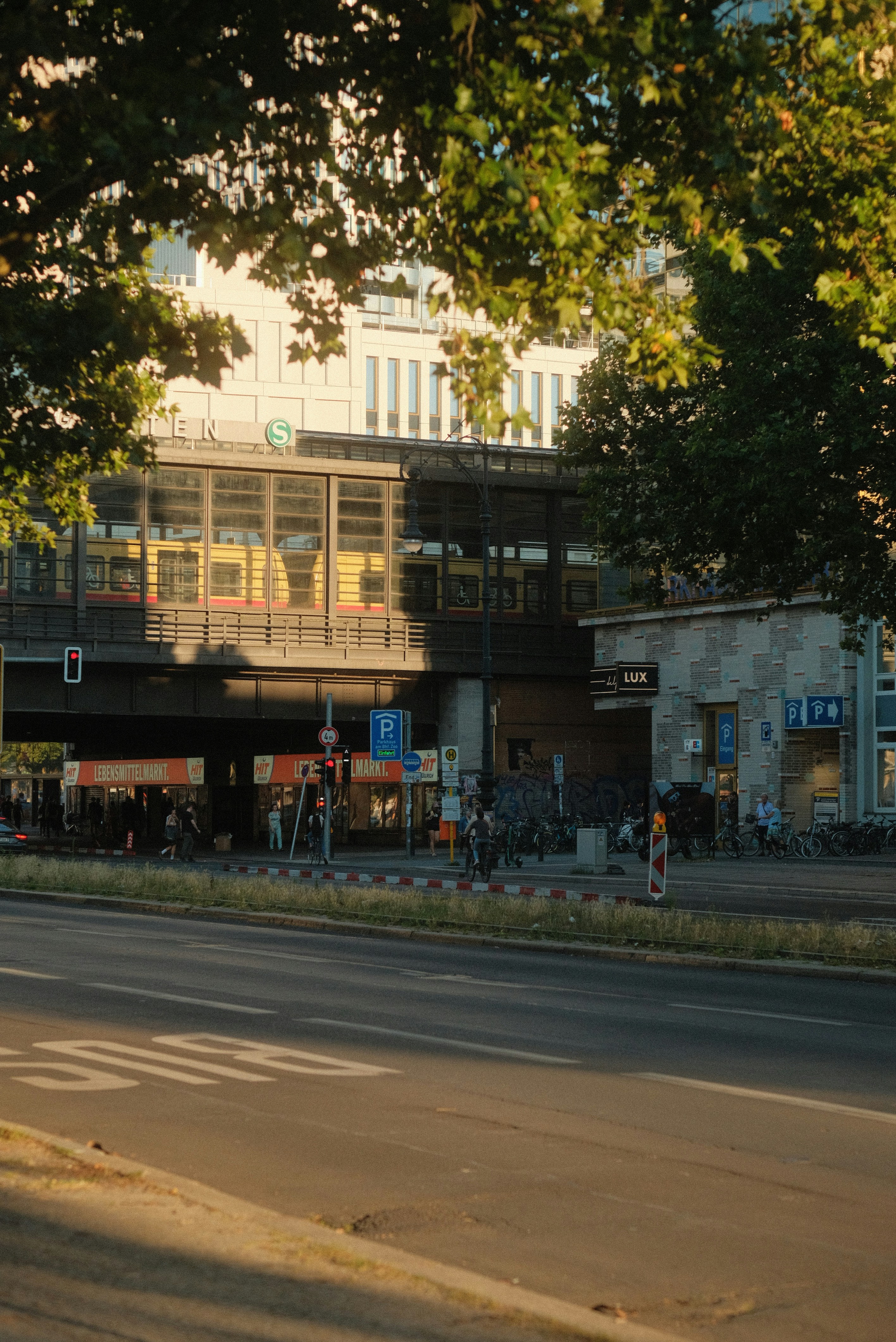 A city street with a bridge over it