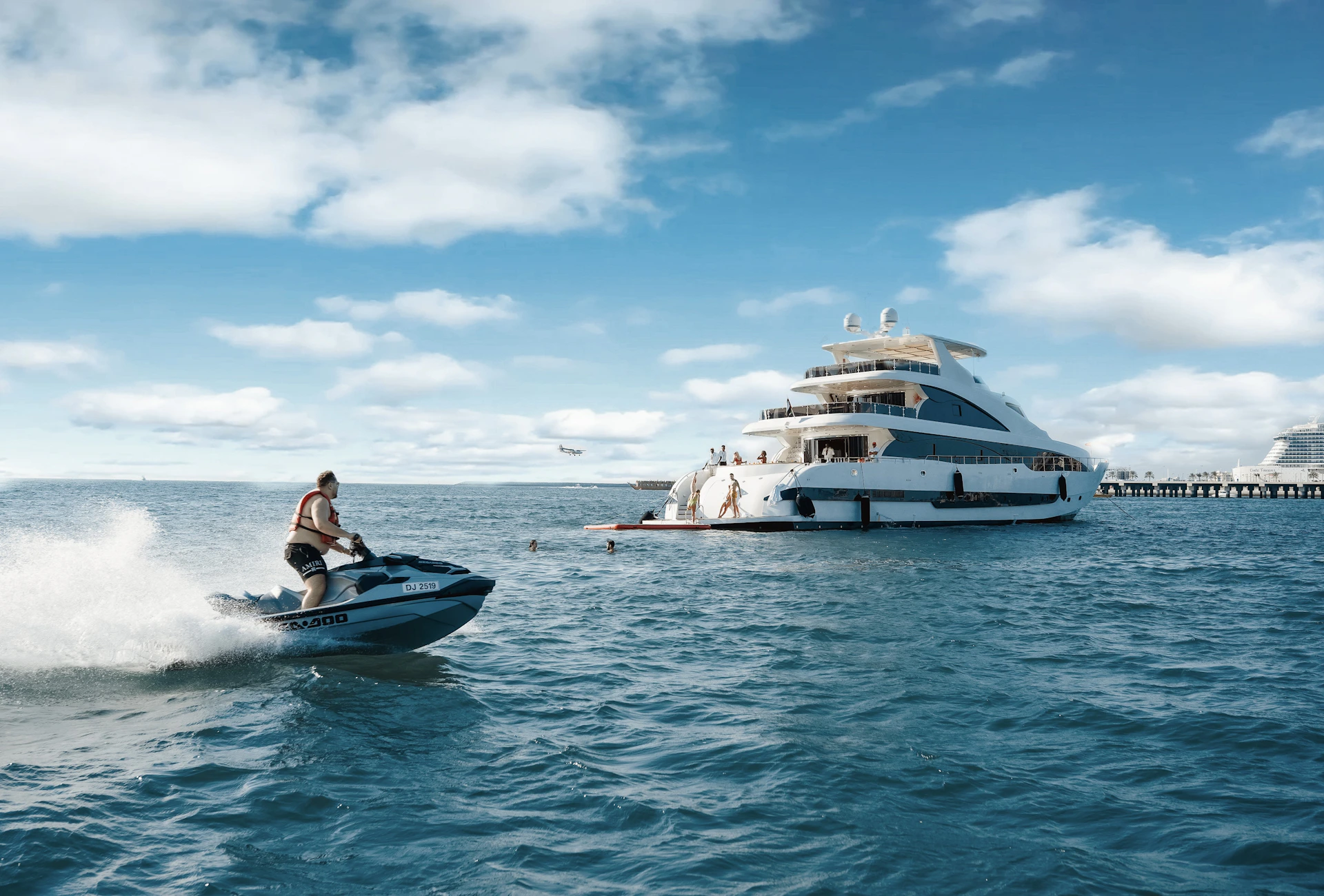 A man riding a jet ski on top of a body of water