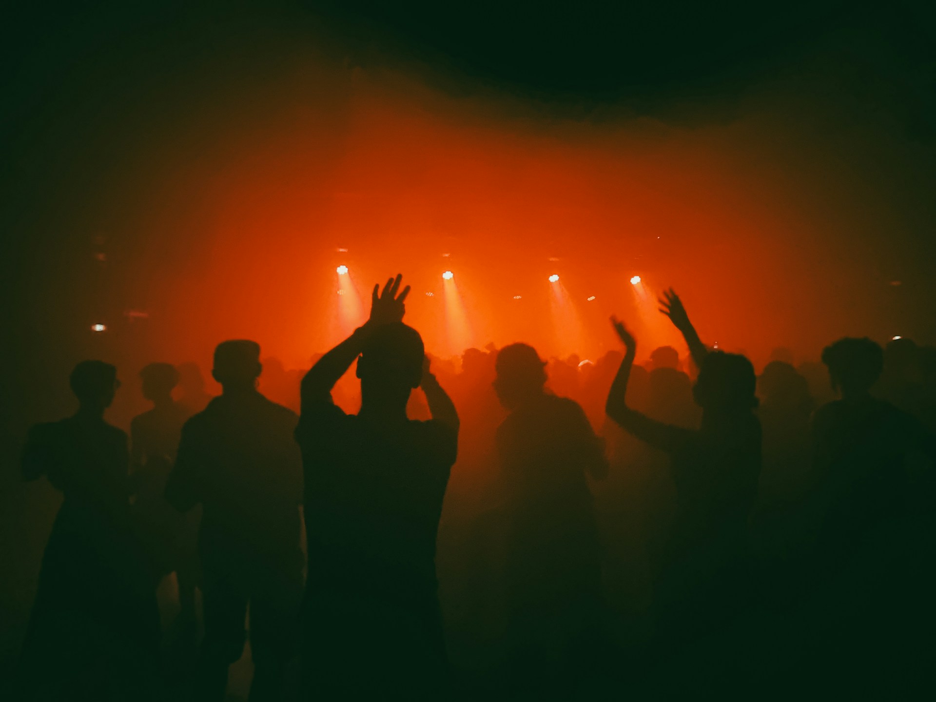 A group of people standing on top of a stage