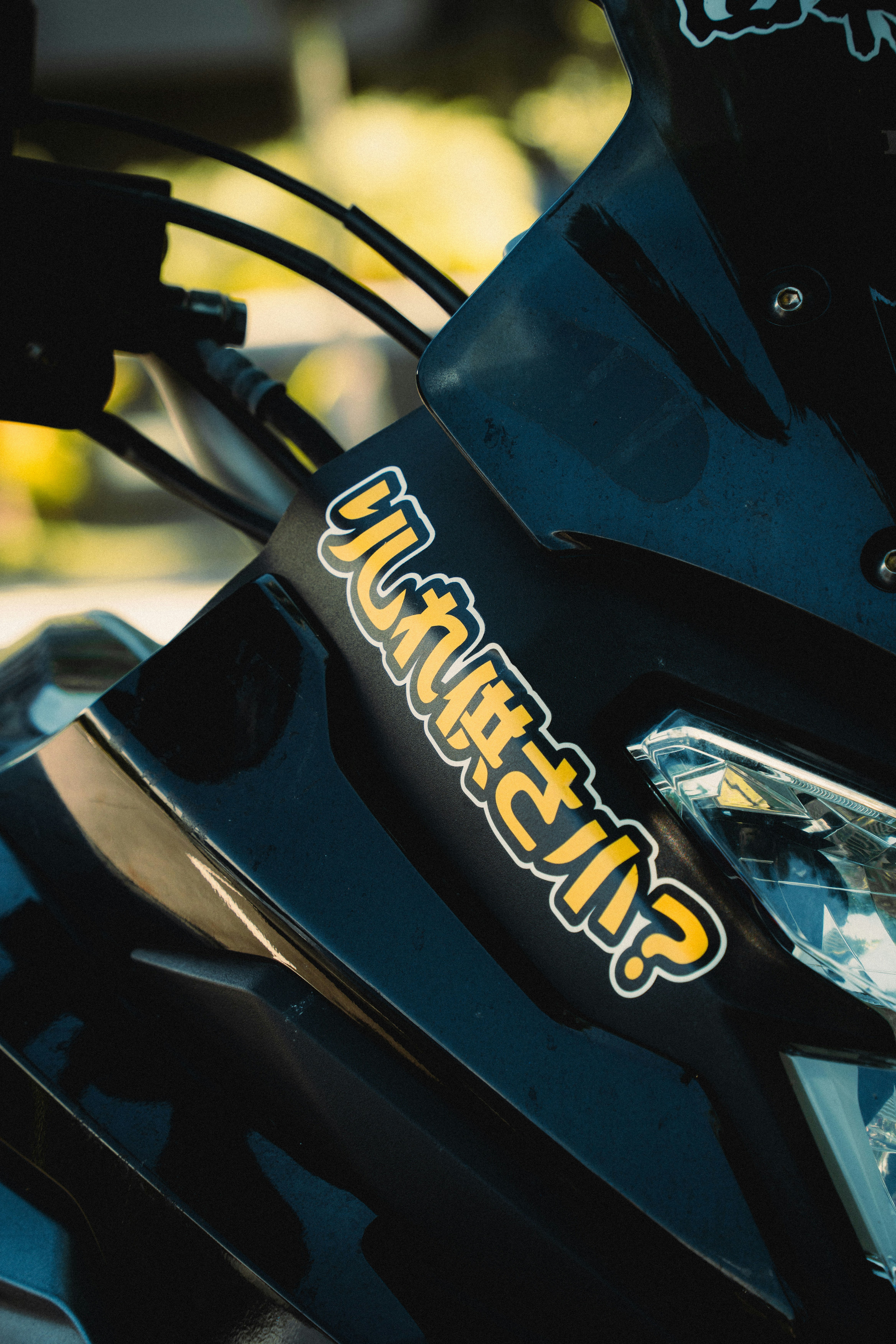 A close up of a motorcycle parked on a street