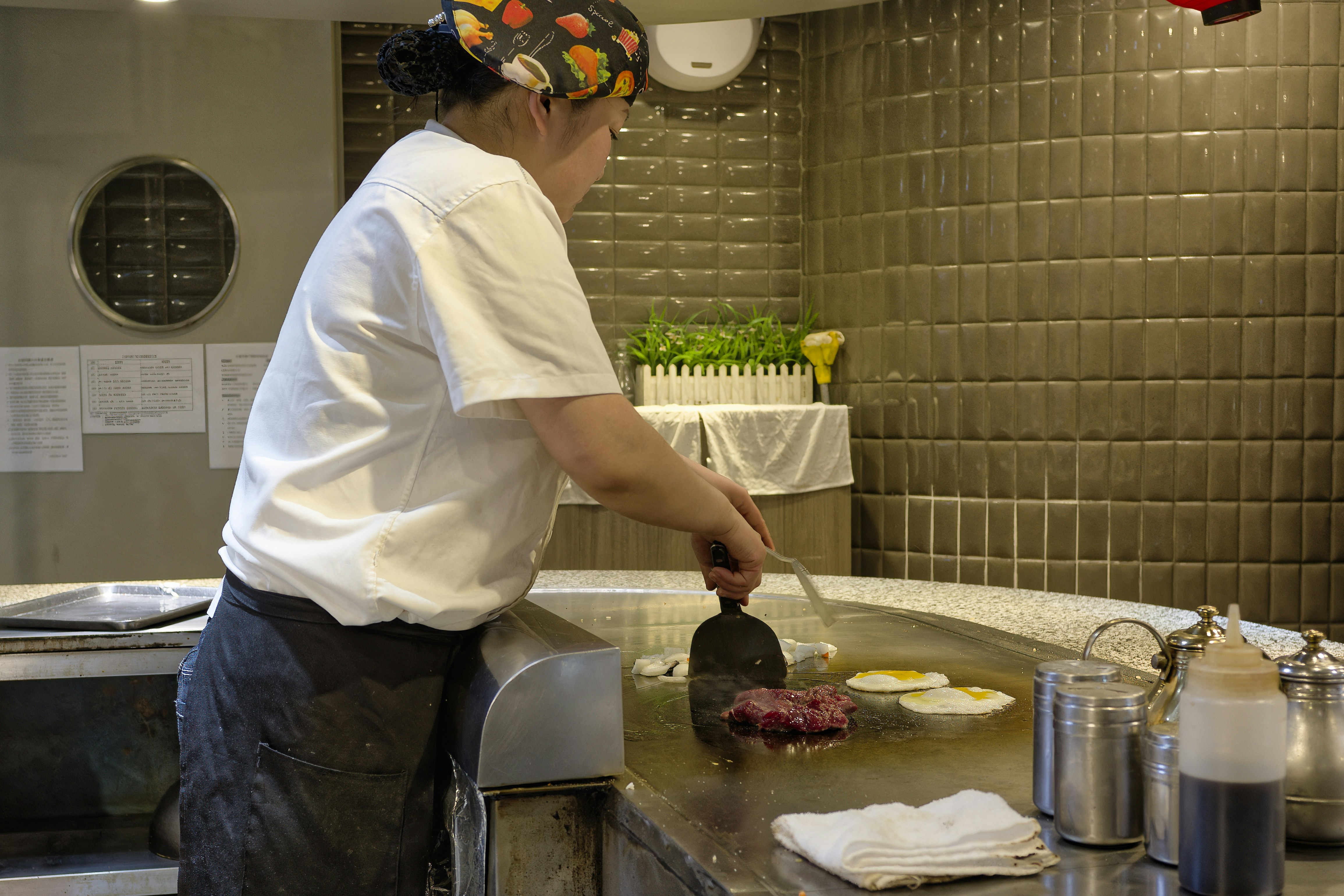 Chef cooking on grill