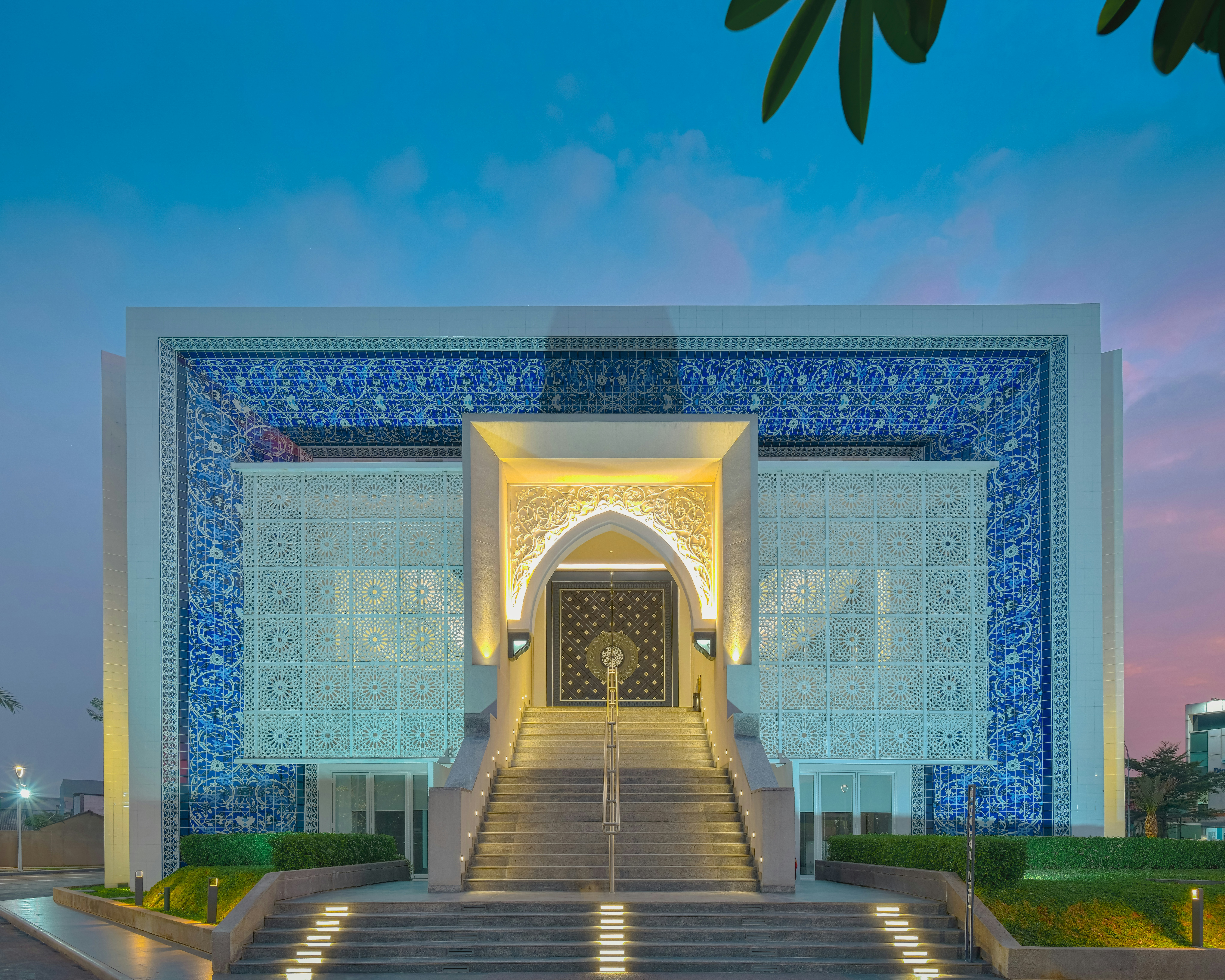 A large building with stairs leading up to it