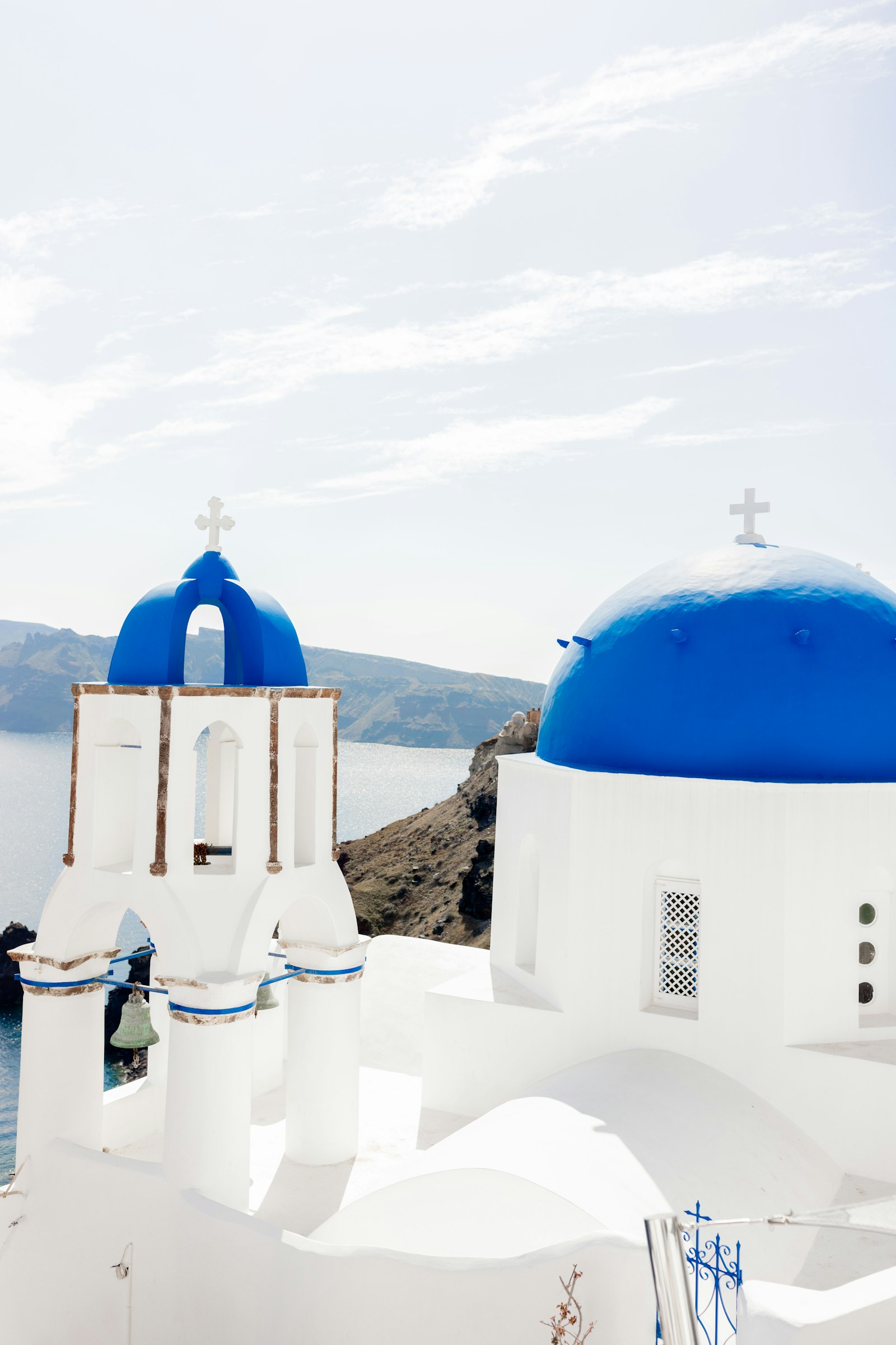Blue domed church overlooking the sea, Santorini Greece