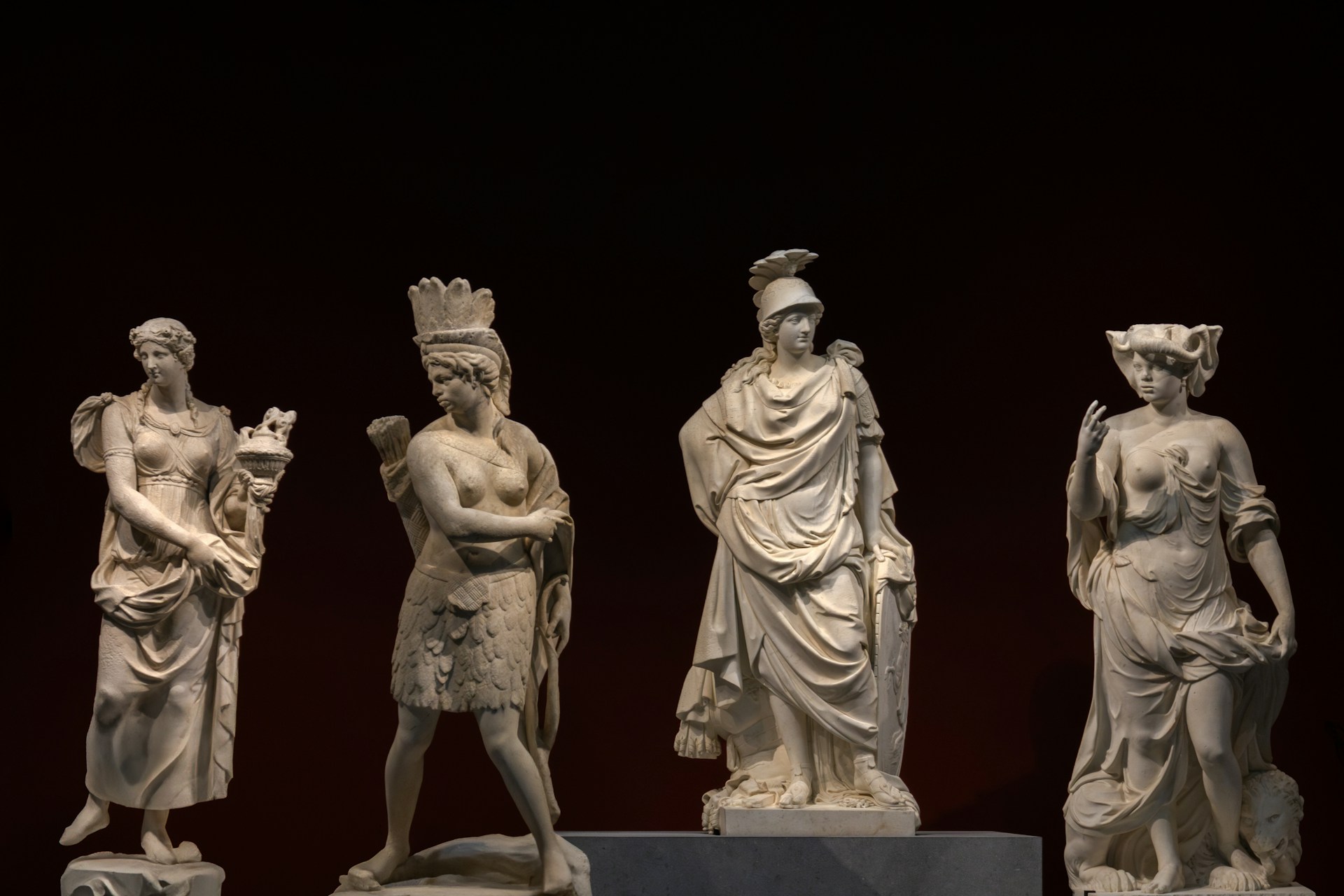 A group of statues sitting on top of a table