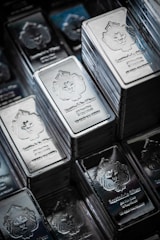 A pile of silver bars sitting on top of each other