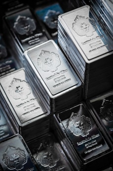 A pile of silver bars sitting on top of each other