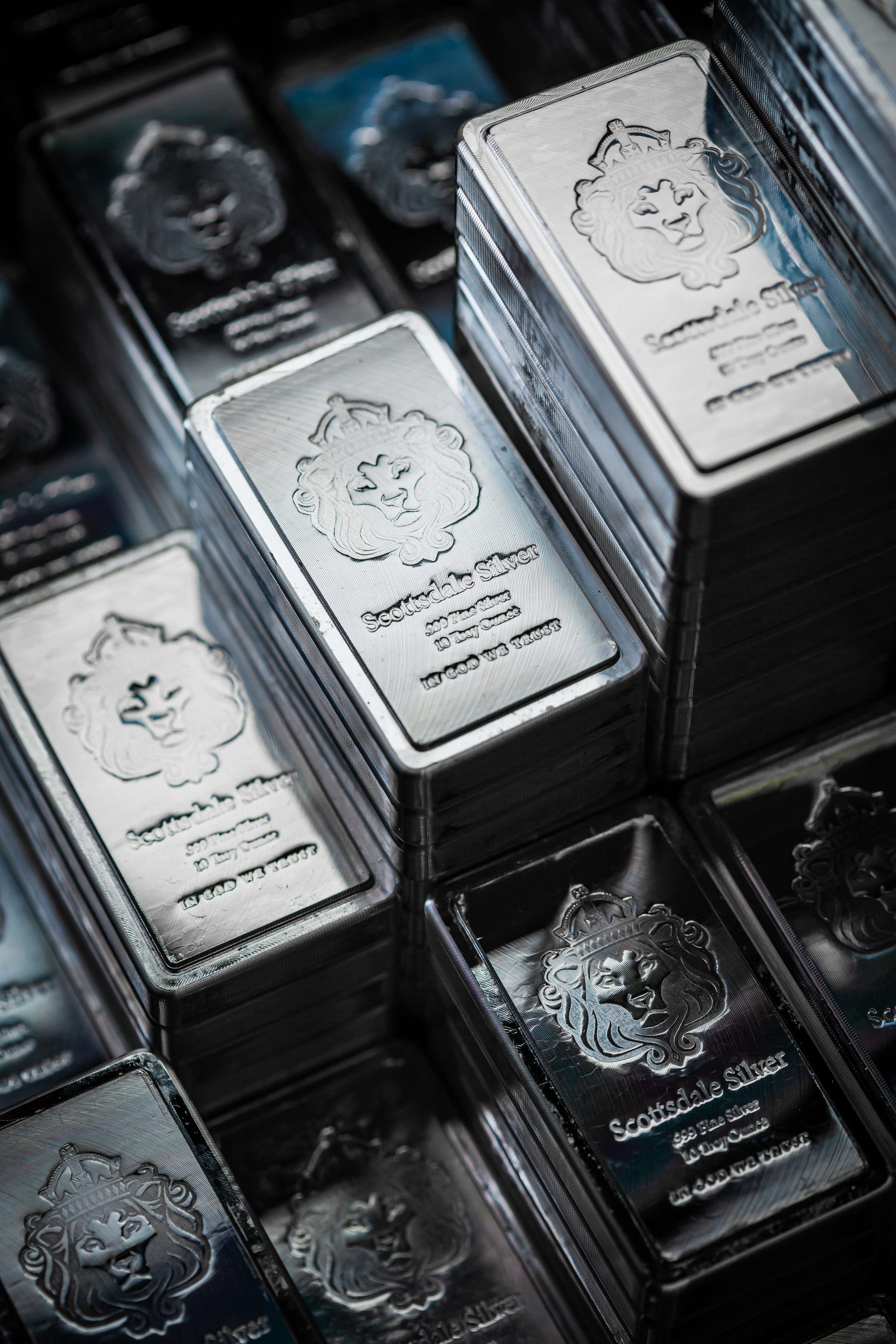 Scottsdalemint.com Pile of Silver stacker bars by Scottsdale Mint on a dark background. 🇺🇸 Minting Gold/Silver in AZ, Legal Tender for 20+ Countries Creator of Silver Stacker® Bars . We are a US private mint based in Scottsdale Arizona. We design, manufacture and deliver the best silver and gold coins and bars on the market for both consumers, banks and governments around the world. Please give us a mention!