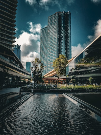 A body of water surrounded by tall buildings