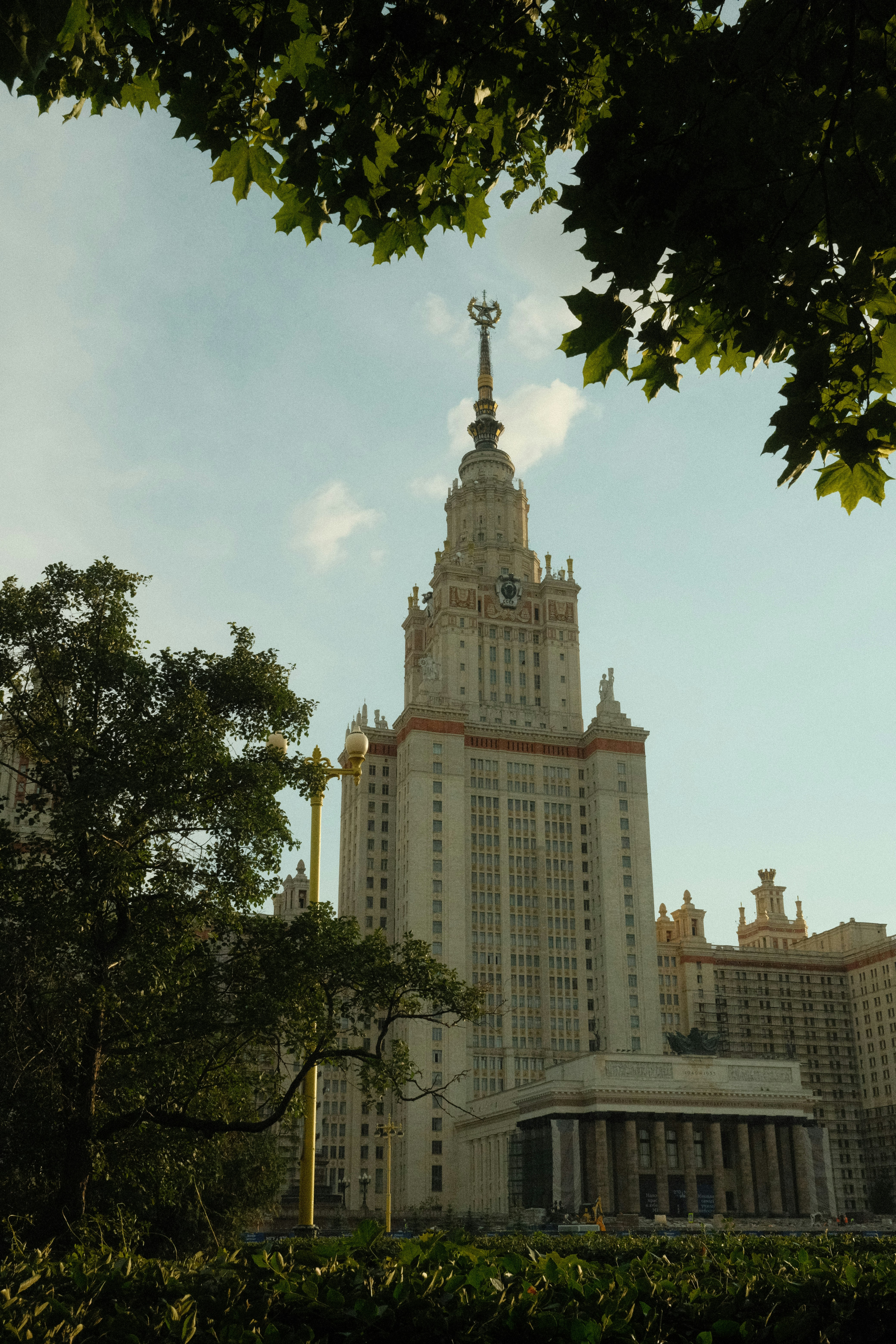 A very tall building with a cross on top of it