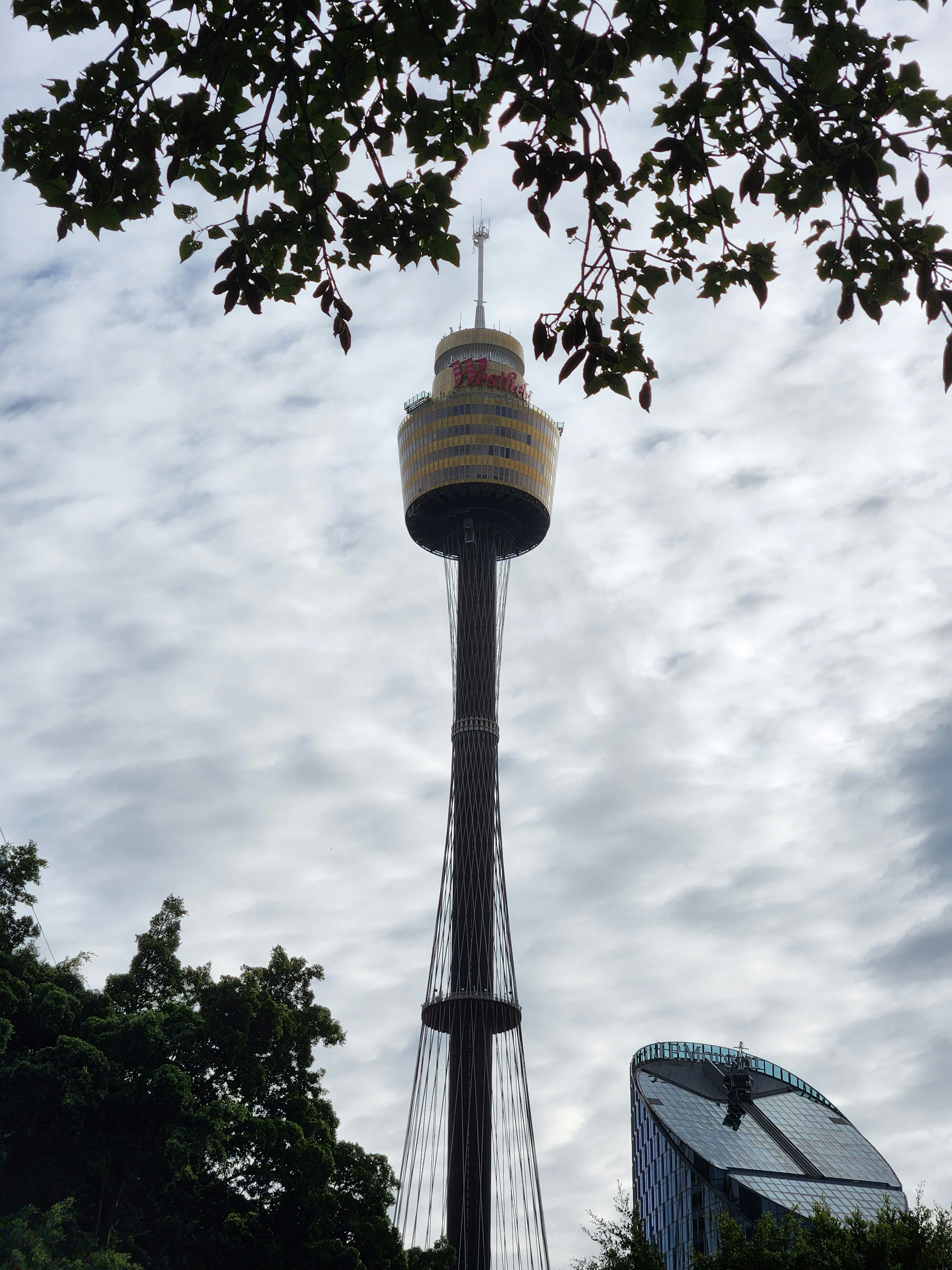 A tall tower with a sky background