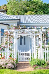 A white house with a white picket fence