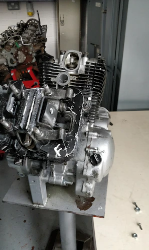 The engine of a car is sitting on a table