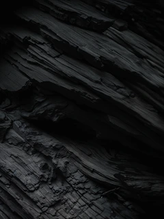 A close up of a cell phone on a wooden surface