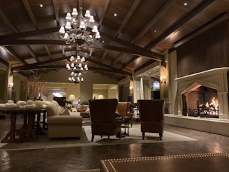 A living room filled with furniture and a fire place