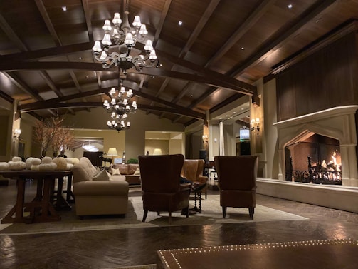 A living room filled with furniture and a fire place