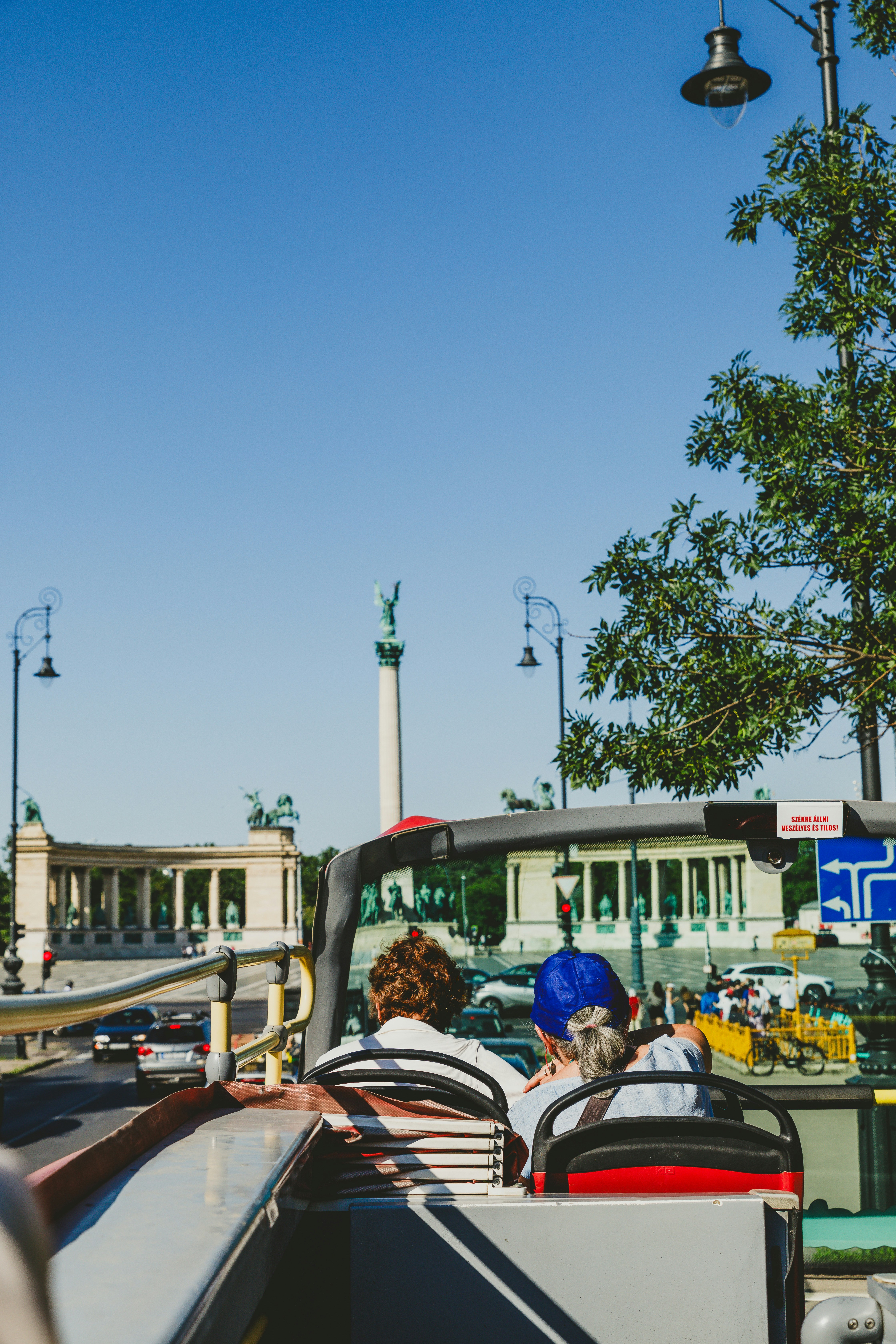 A group of people riding on top of a boat