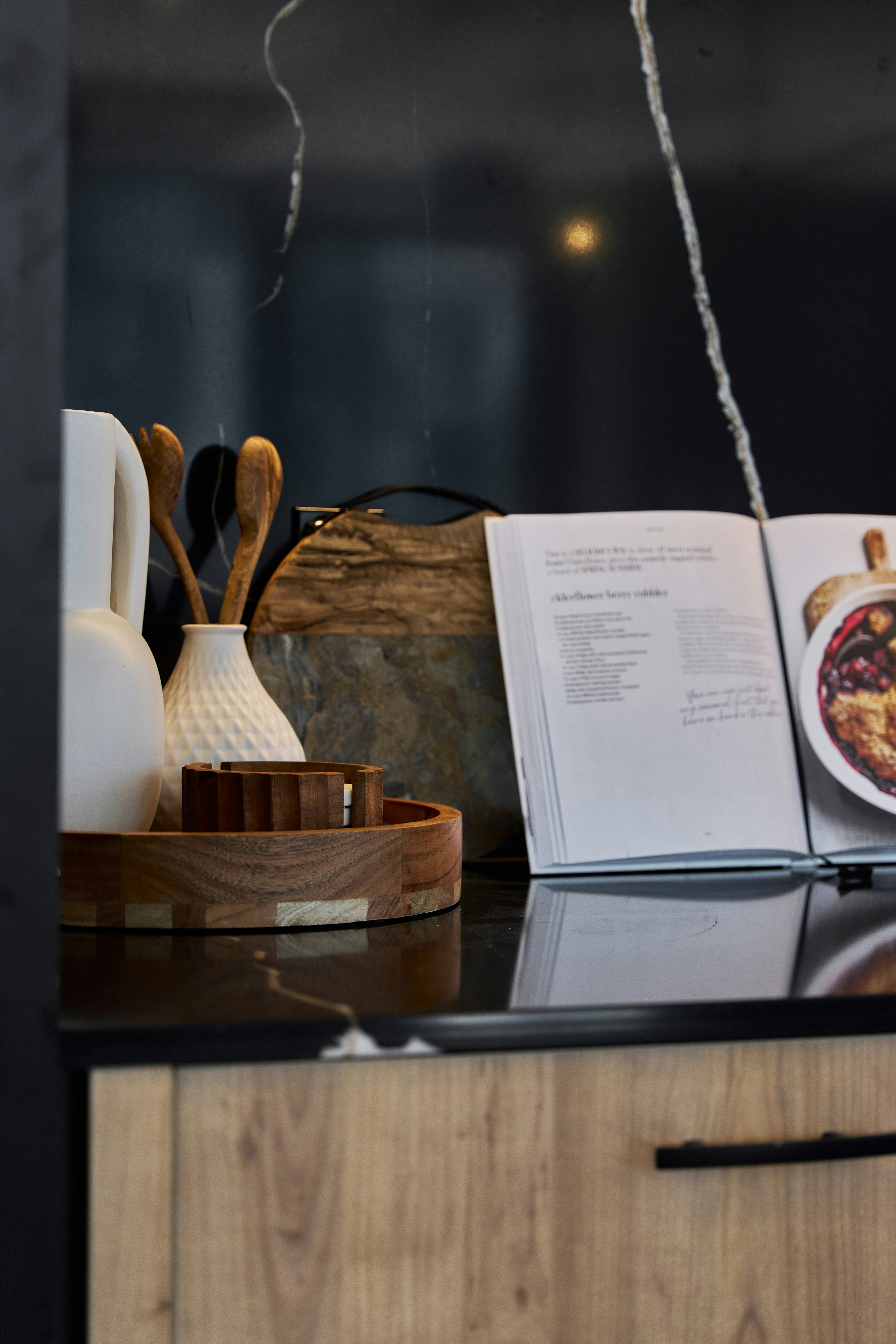 An open book sitting on top of a counter