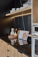 A kitchen with a microwave and a counter top