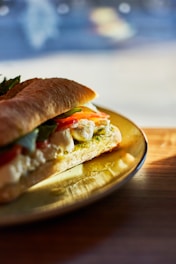 A sandwich on a plate on a table