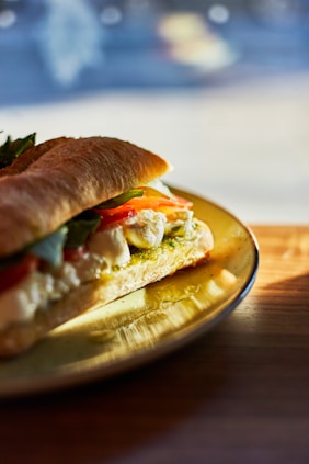 A sandwich on a plate on a table
