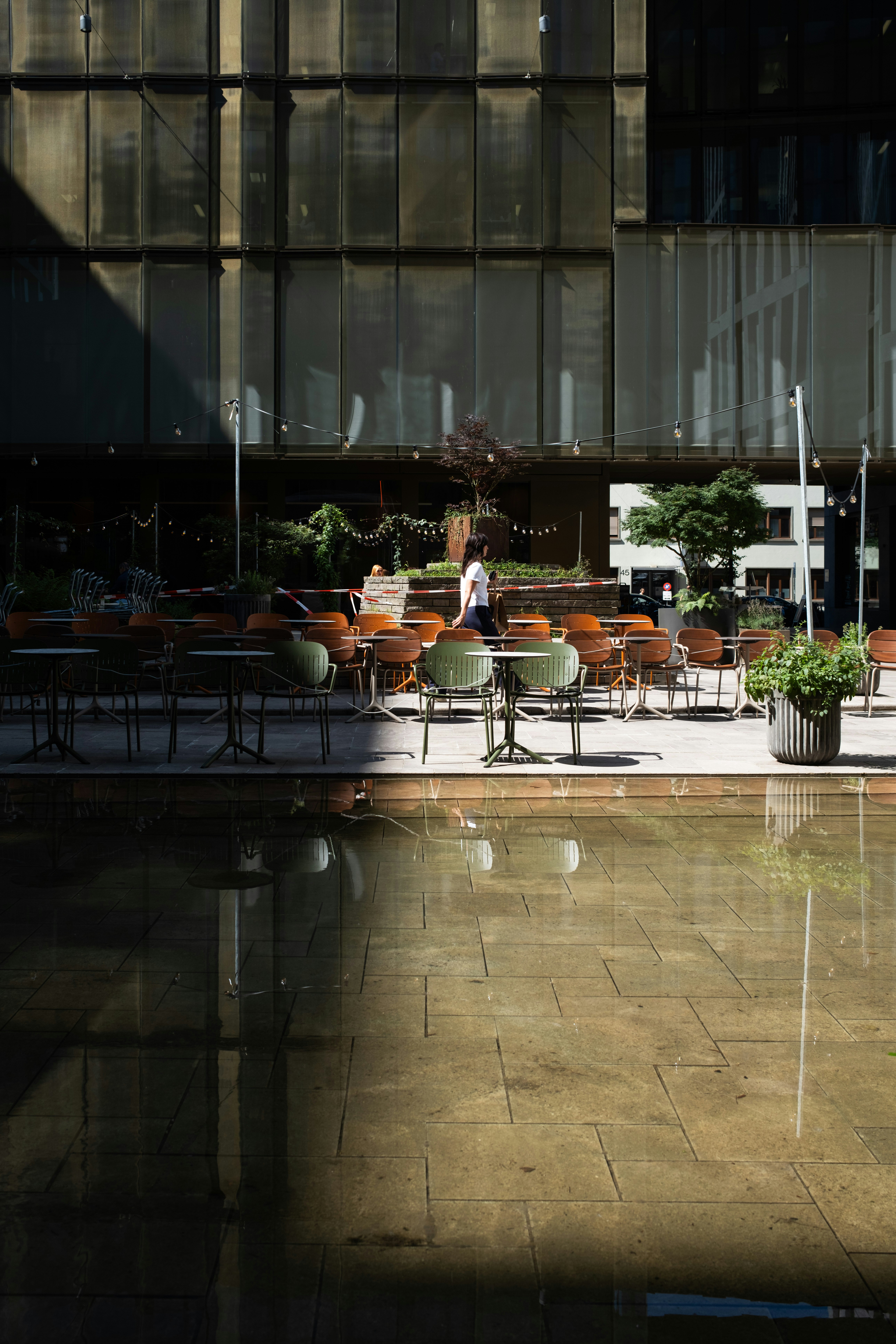A large building with a lot of tables and chairs