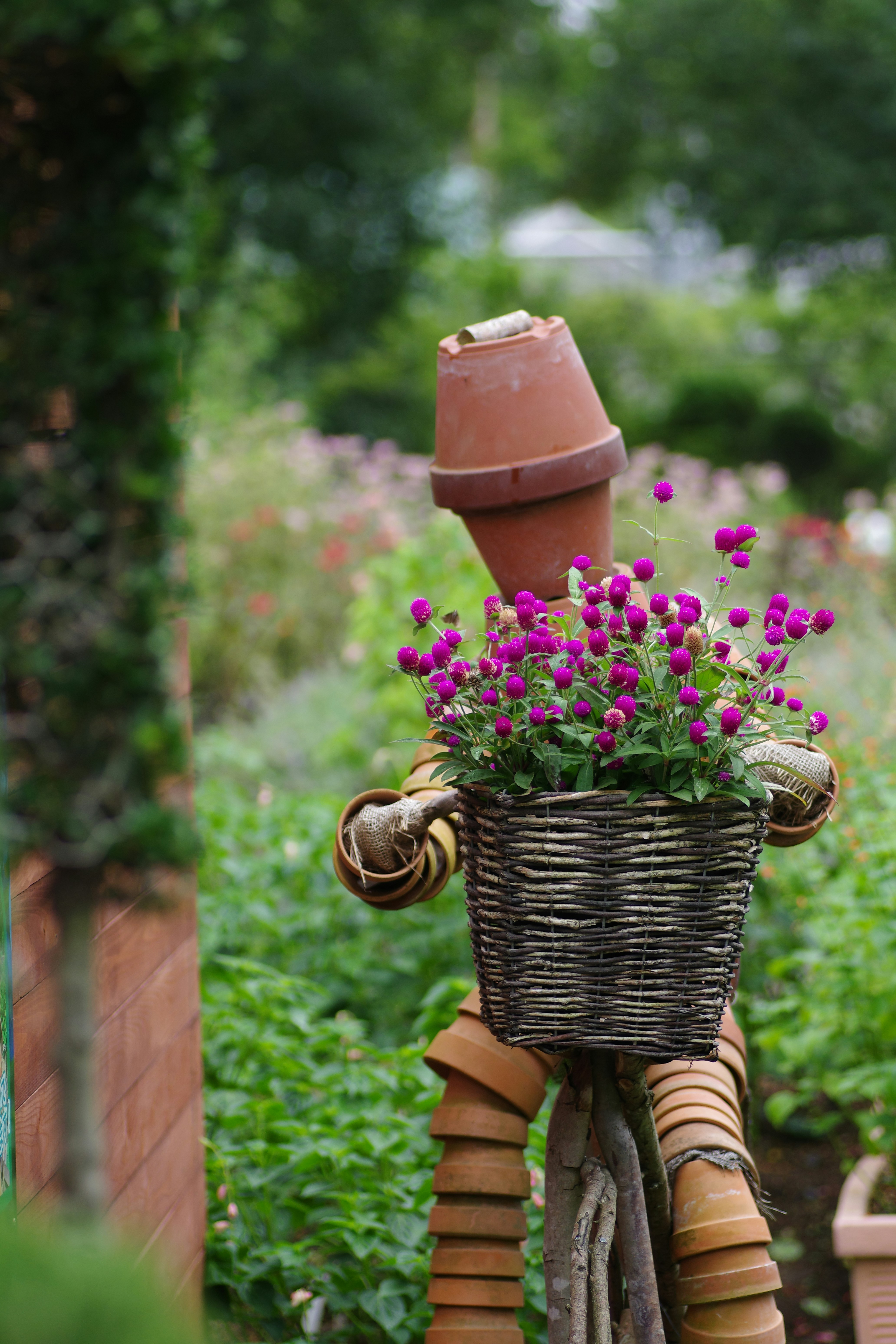A basket of flowers sitting on top of a bike