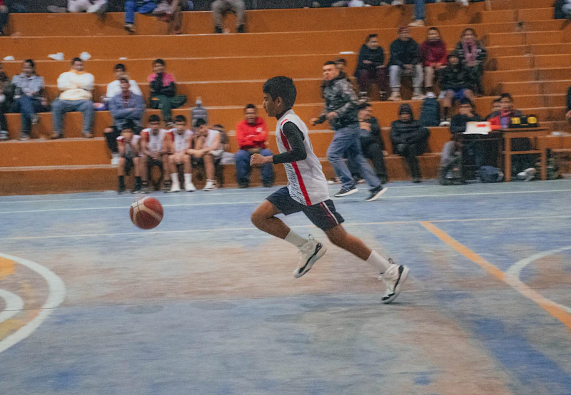 Basketball player dribbling the ball during a game