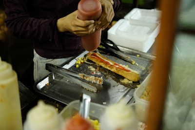 A person preparing food in a kitchen
