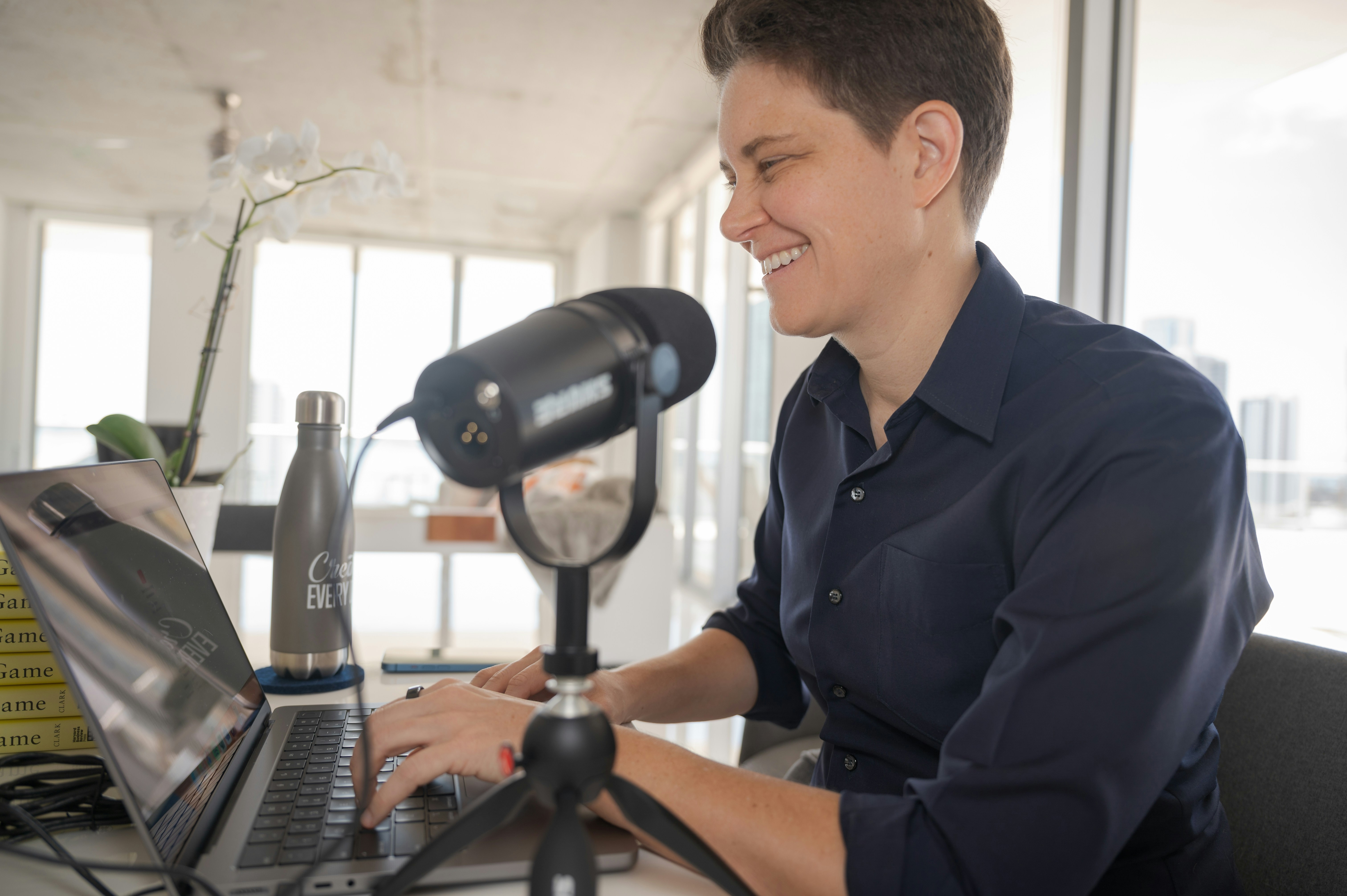 A man sitting in front of a laptop computer