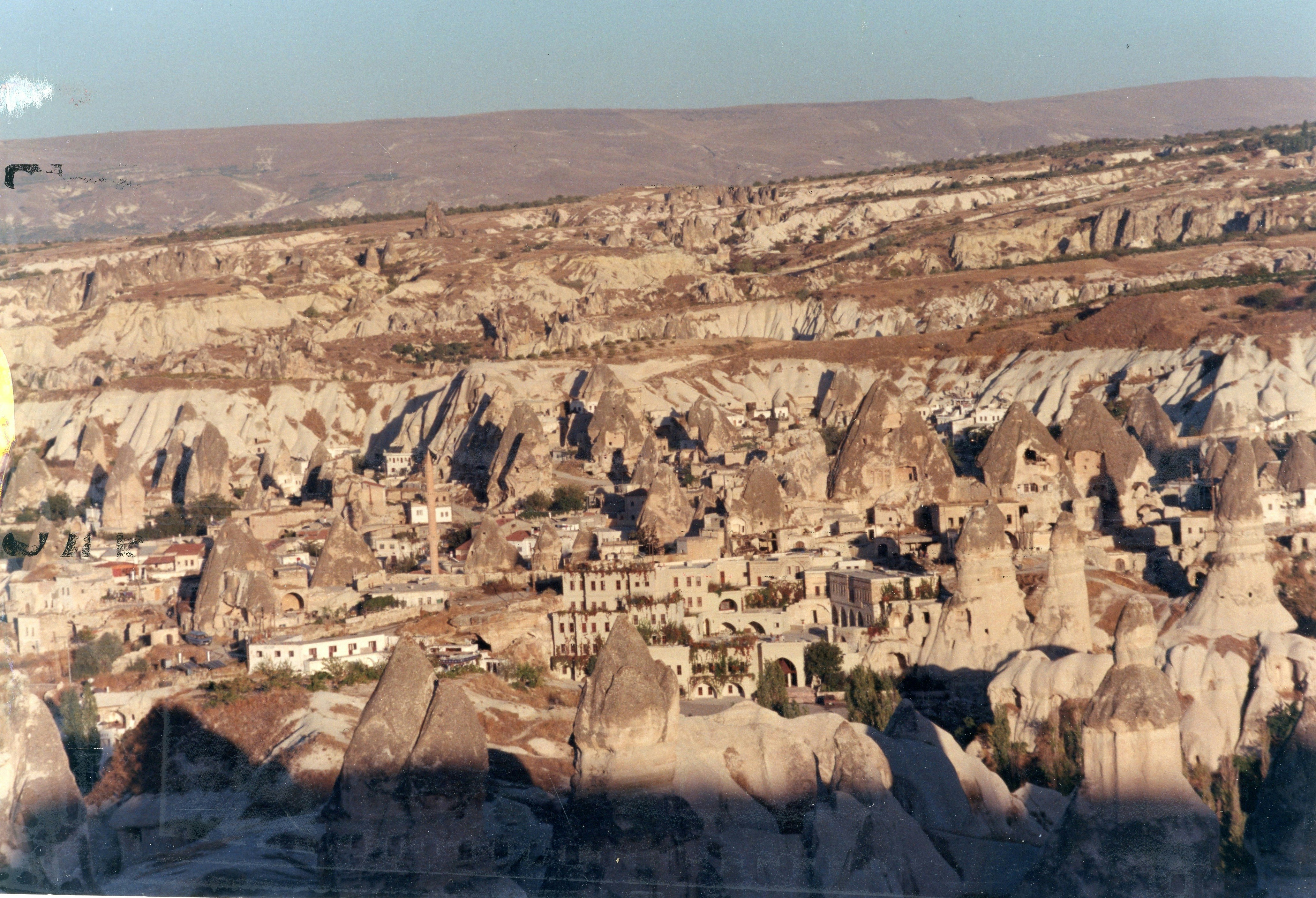 A picture taken from a plane of a rocky landscape, 