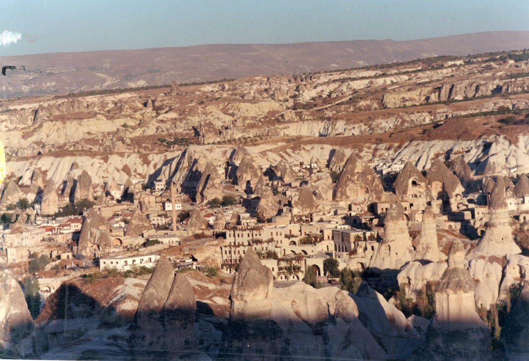 A picture taken from a plane of a rocky landscape,