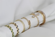 A stack of rings sitting on top of a white napkin