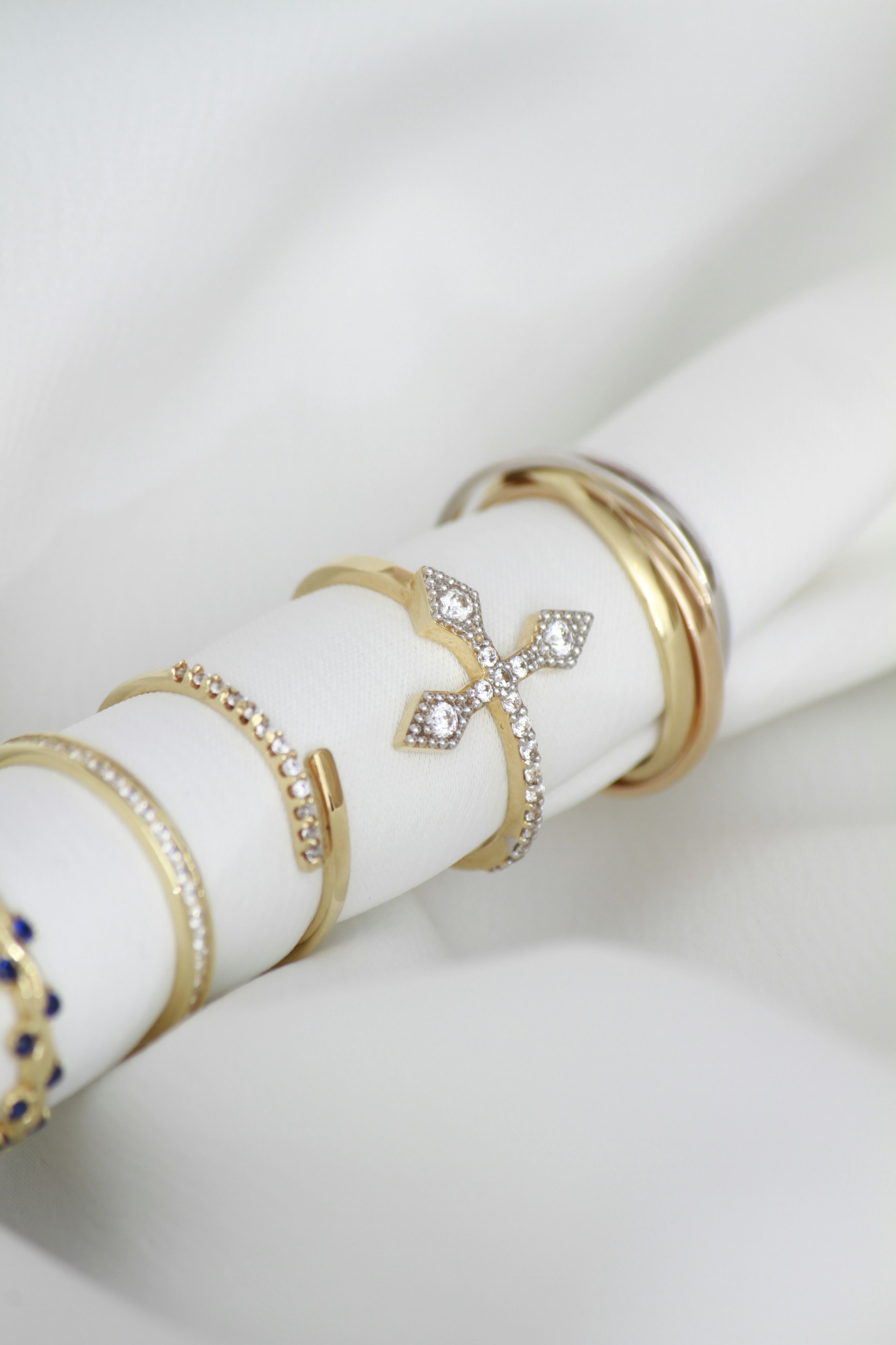 A close up of a napkin with rings on it