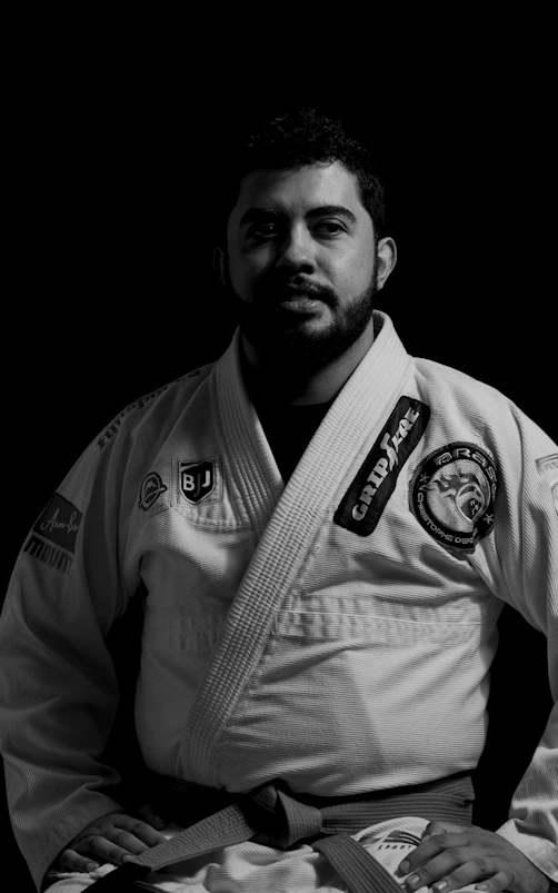 A man in a kimono is posing for a picture