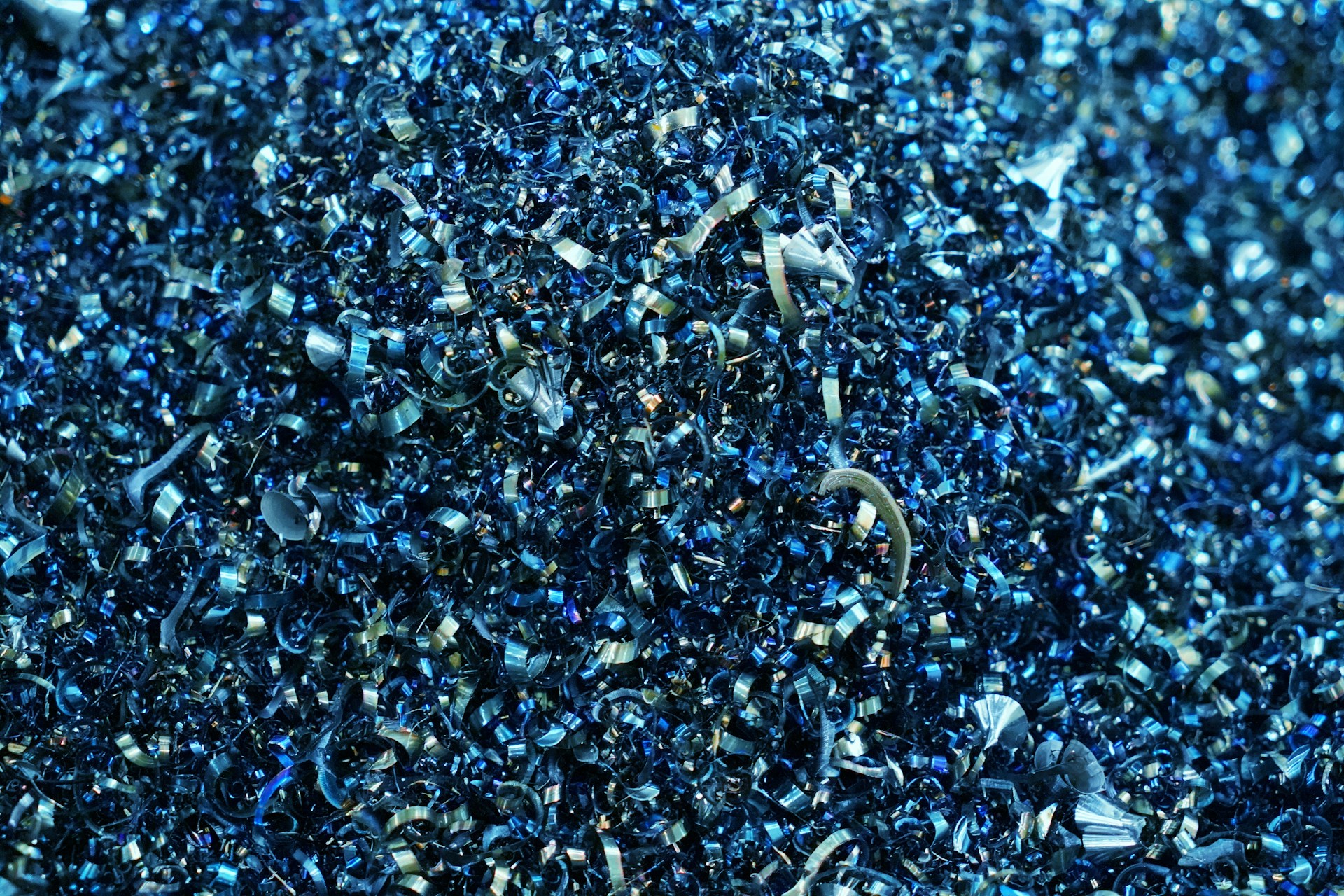 A close up of a pile of blue glitter
