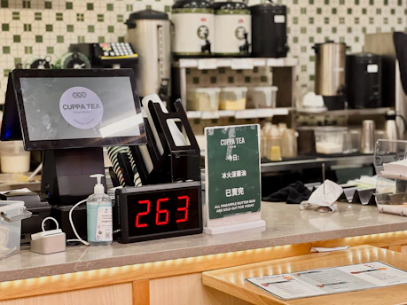 A counter with a clock and a counter top