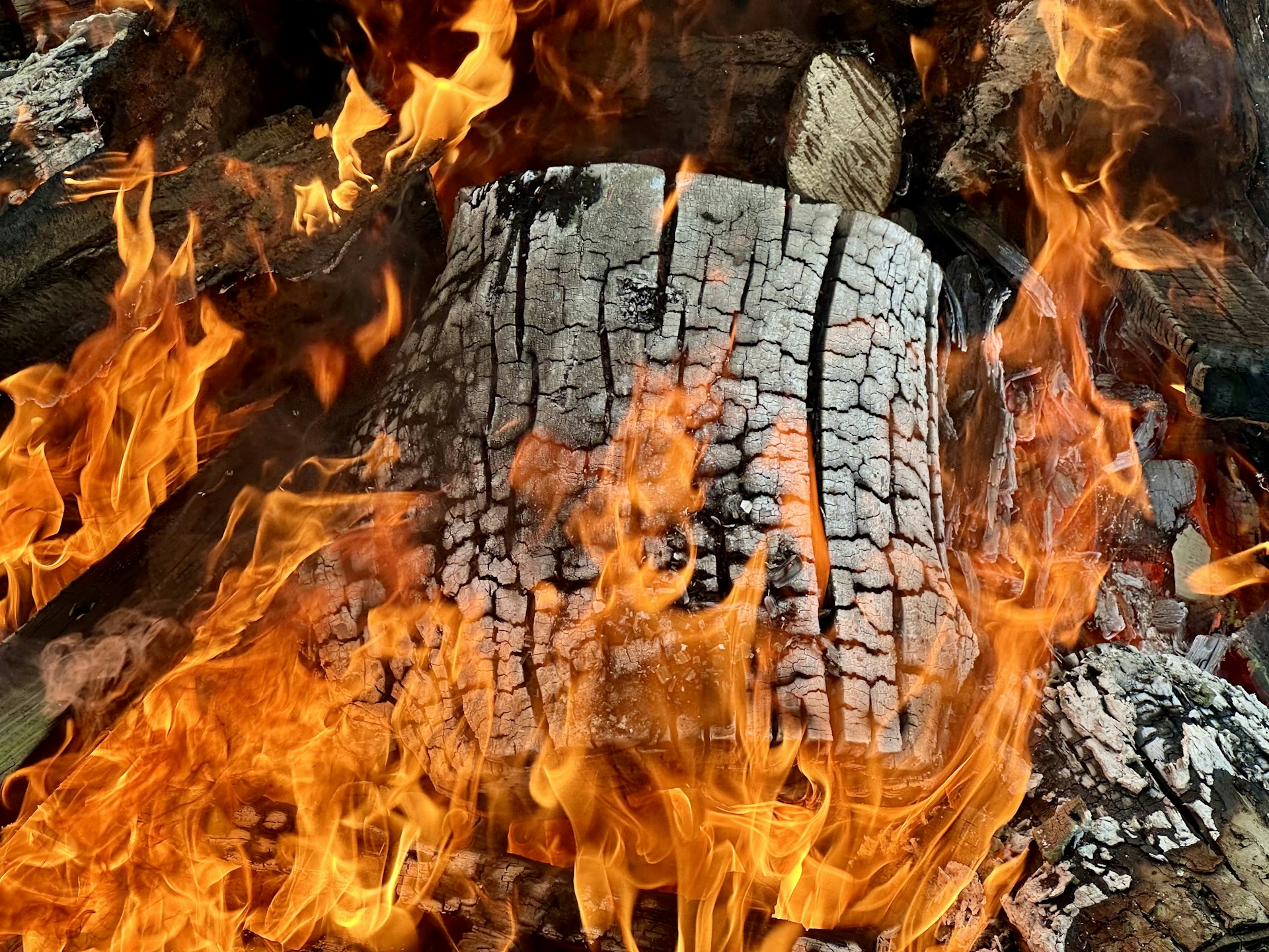 A close up of a tire on fire