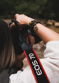 A woman taking a picture with a camera