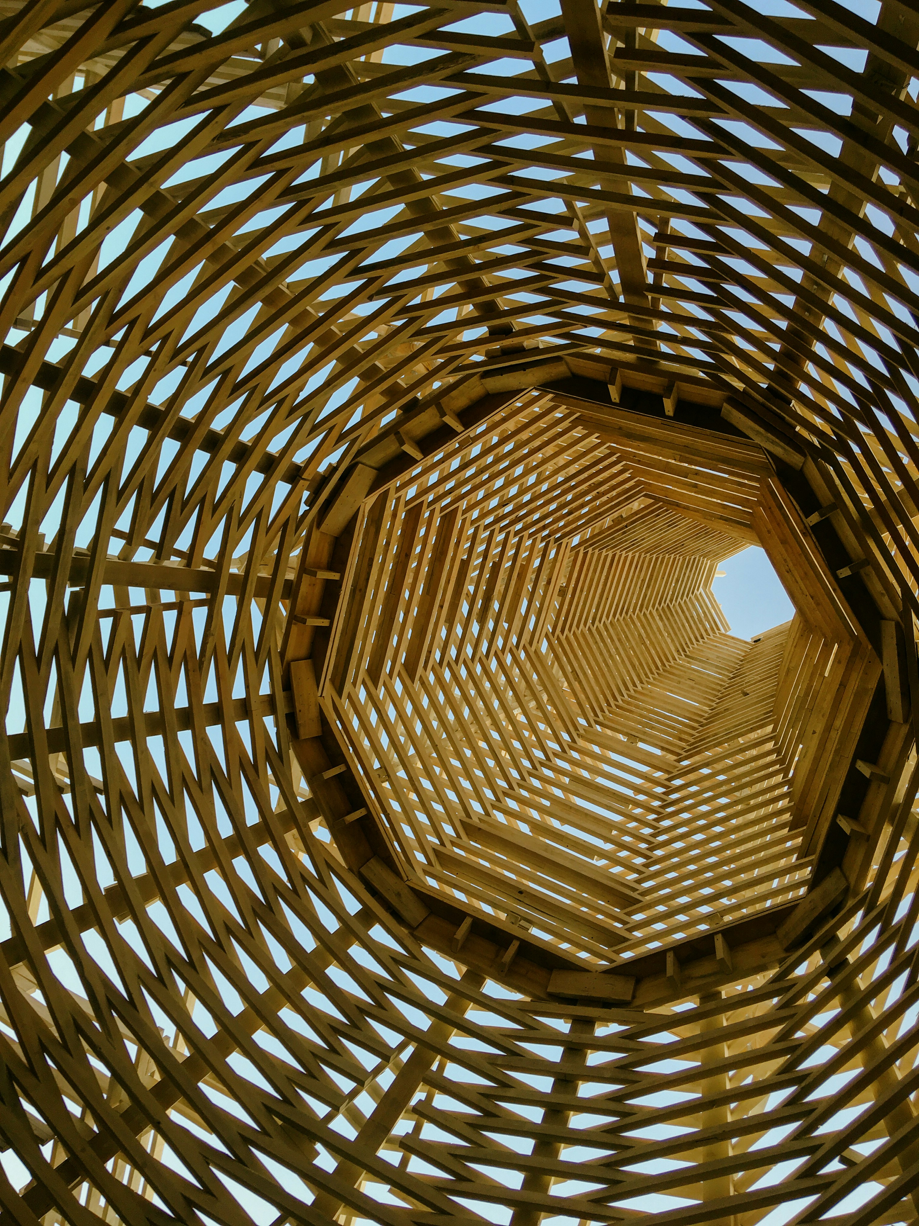 A large wooden structure with a sky in the background