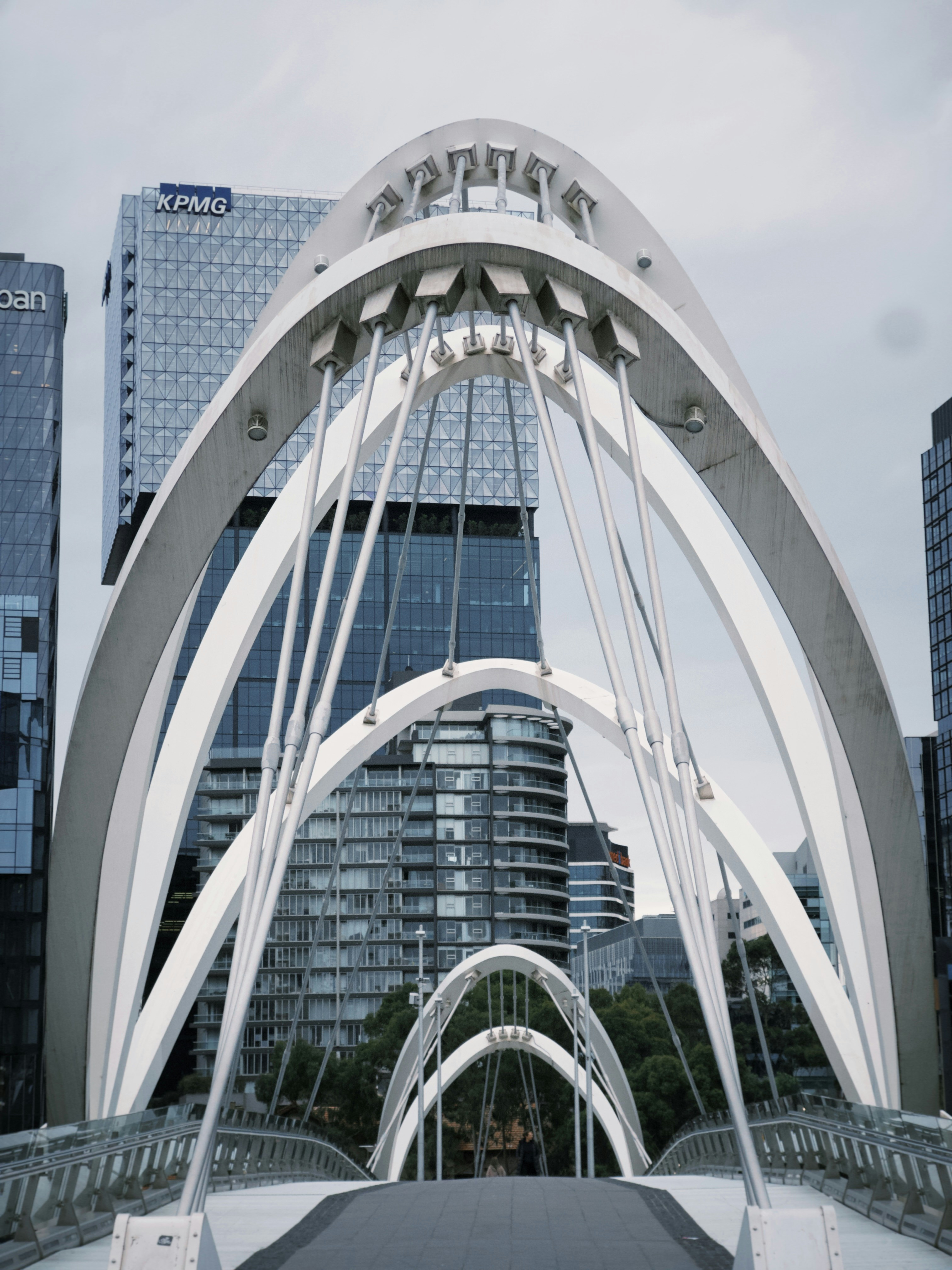 A bridge that has a walkway going across it