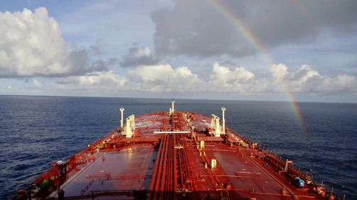 A large cargo ship in the middle of the ocean