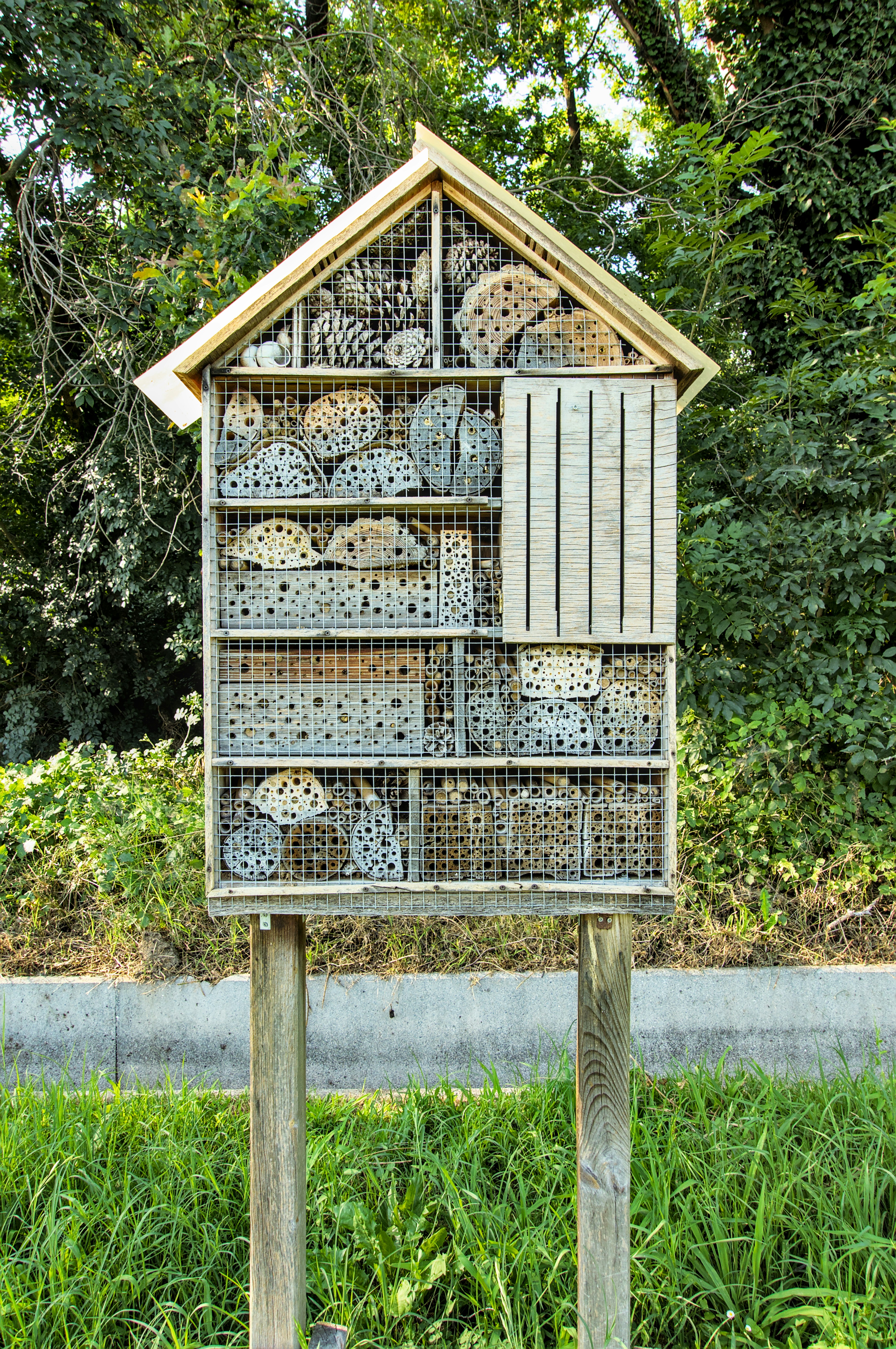 A bird house made out of bird cages