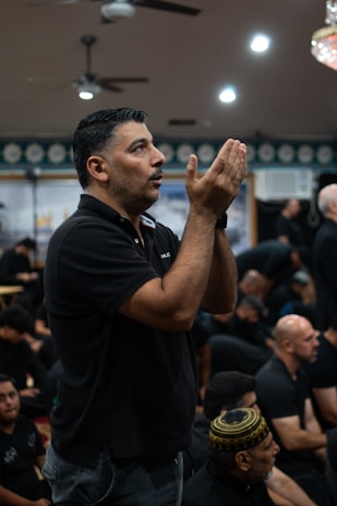 A man standing in front of a crowd of people