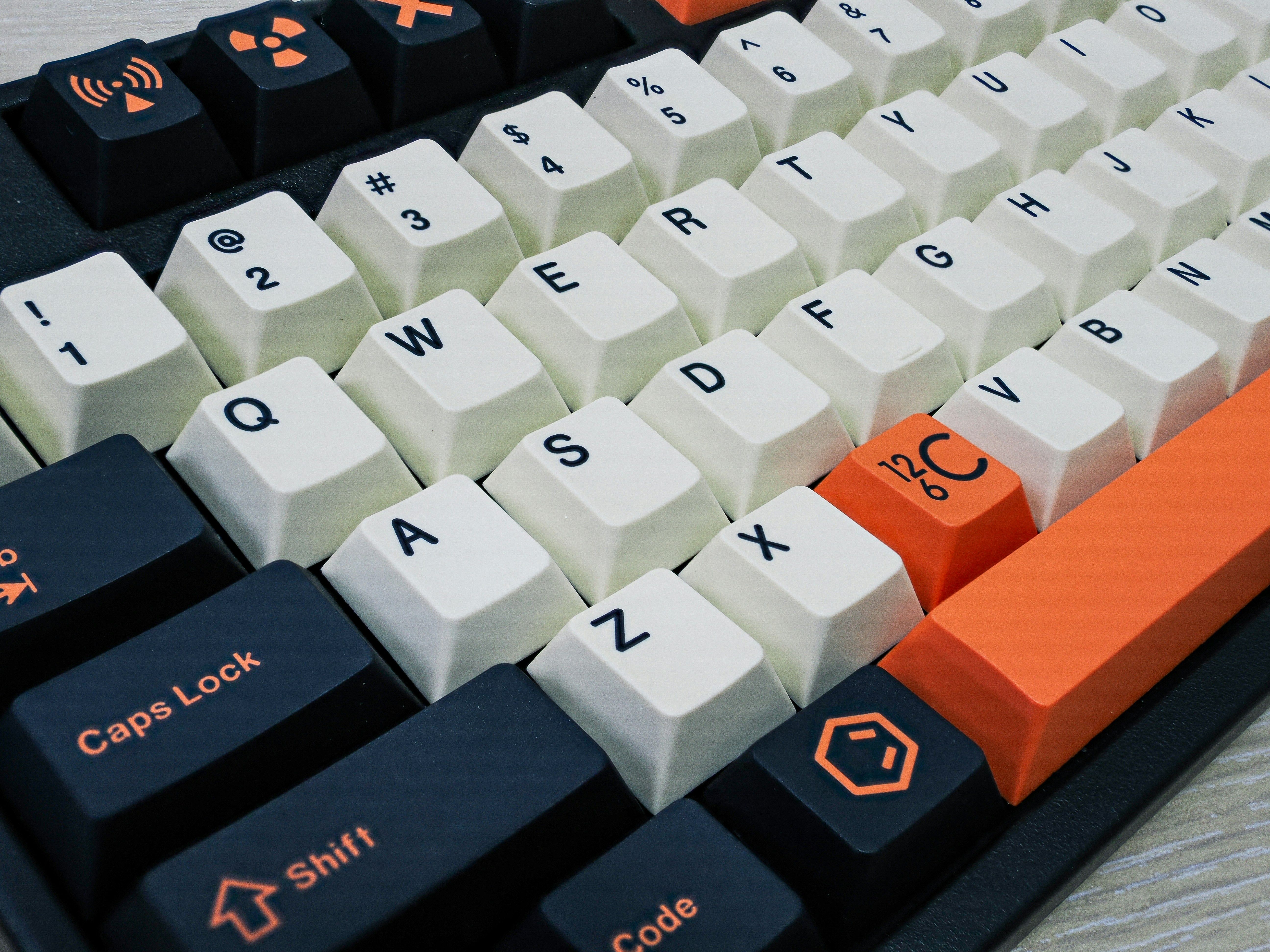 A close up of a computer keyboard on a table