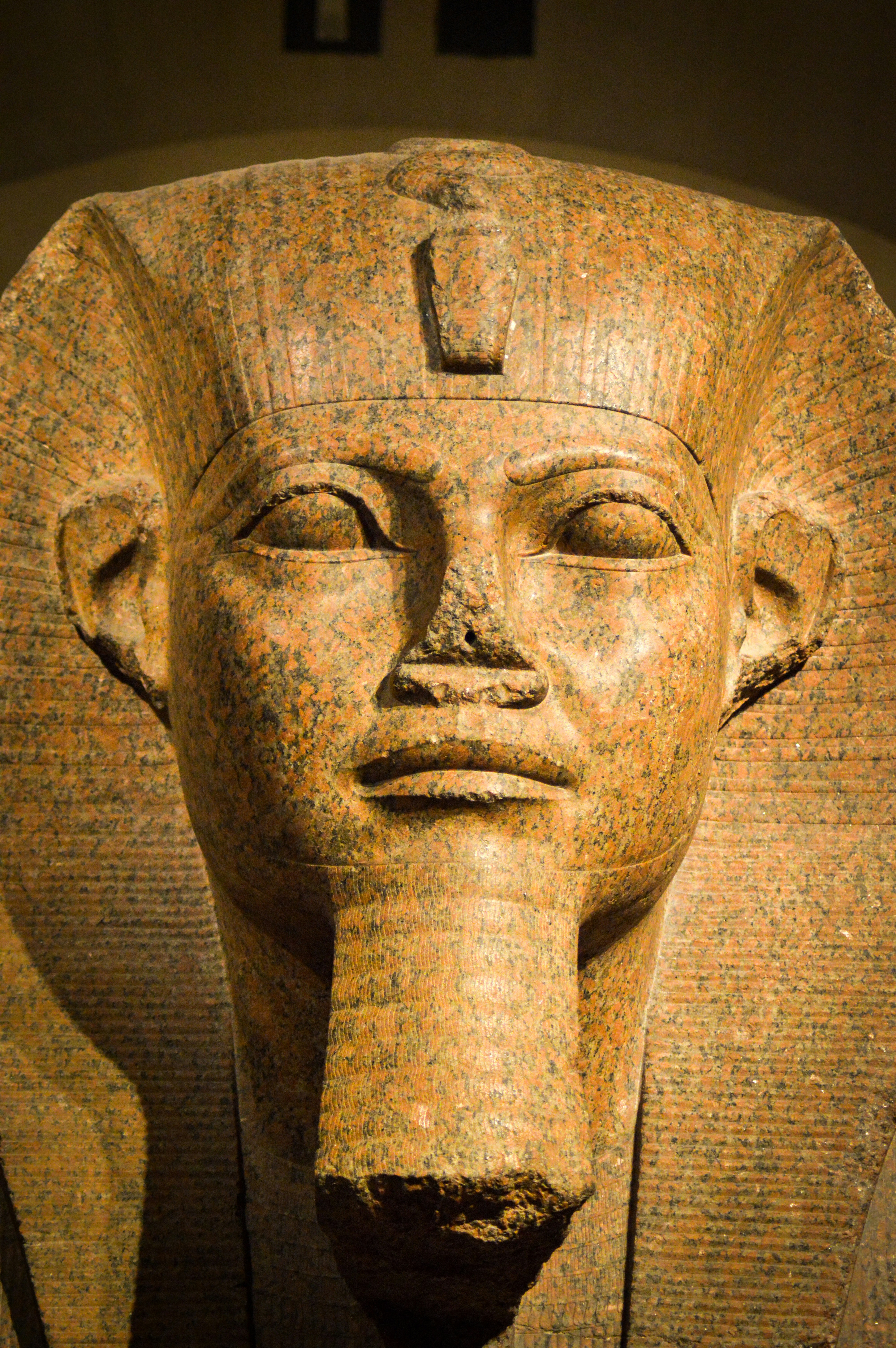 A close up of a statue of an egyptian pharaoh