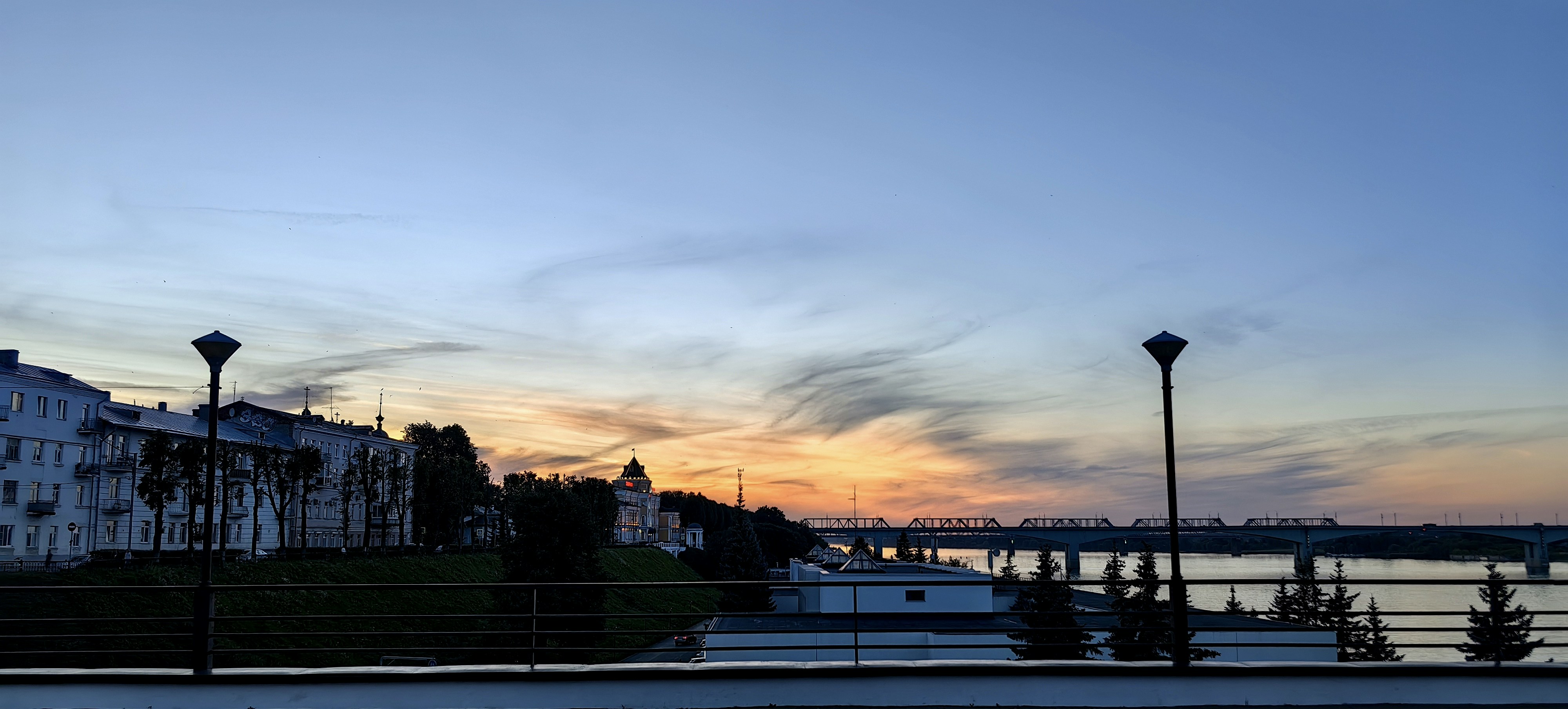 The sun is setting over a body of water