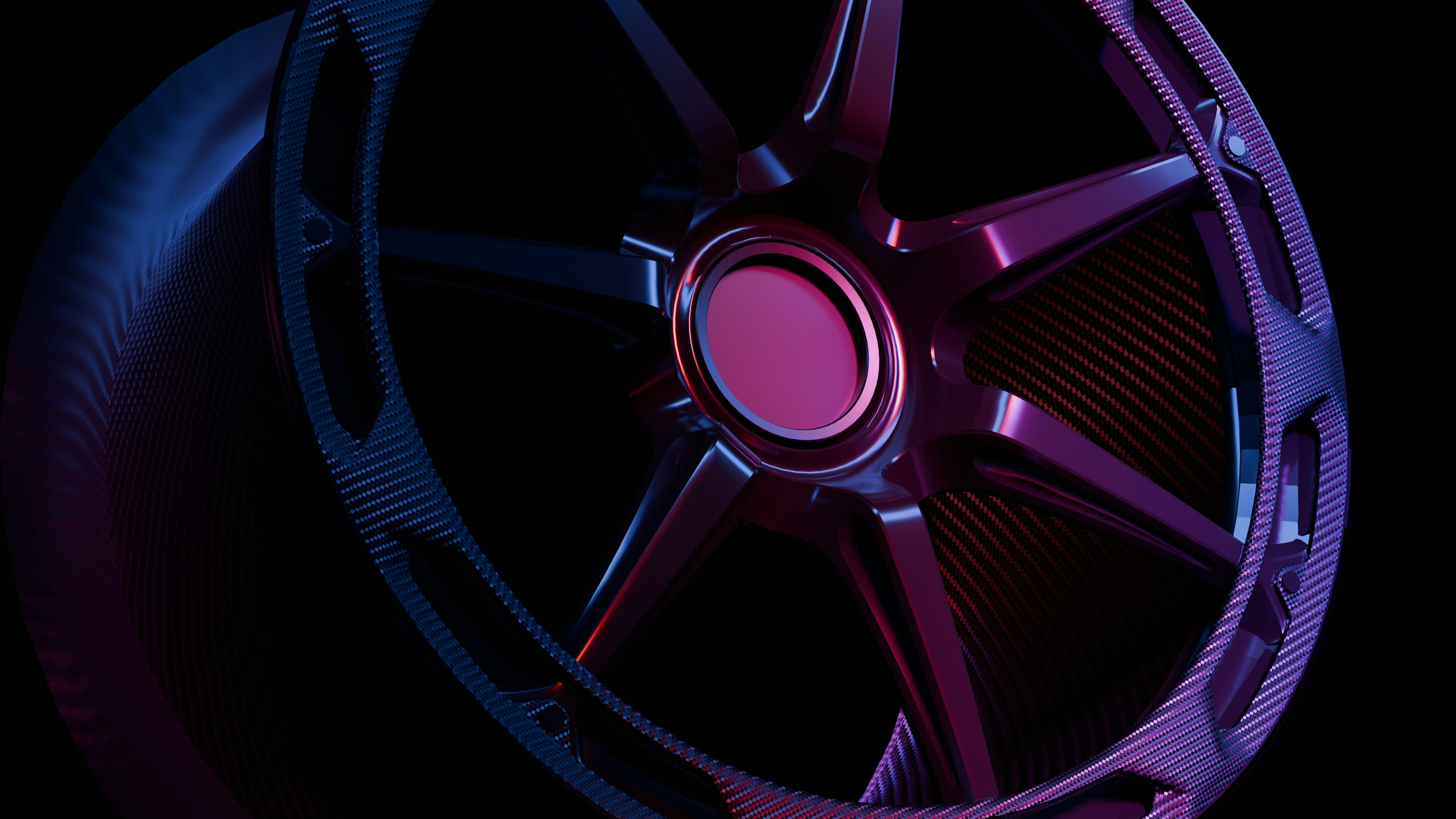 A close up of a wheel on a black background